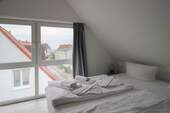 Schlafzimmer mit Hafenblick - 