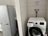 Duschbad mit Waschmaschine - 