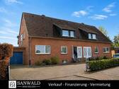 1 - Charmantes Zweifamilienhaus mit Garten und Garage in beliebter Wohnlage