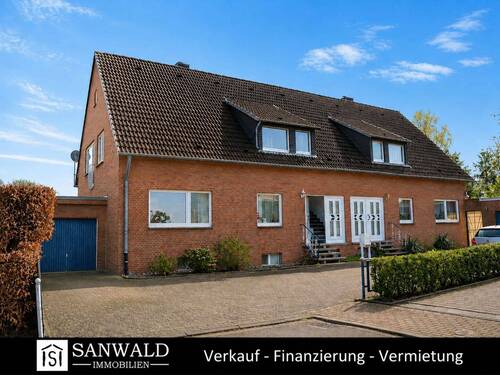 1 - Charmantes Zweifamilienhaus mit Garten und Garage in beliebter Wohnlage