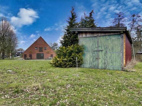 seitliche Ansicht - 7 Zimmer Mehrfamilienhaus, Wohnhaus in Wilsum