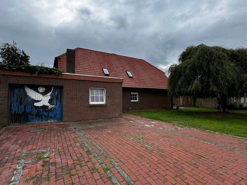 Frontansicht - 8 Zimmer Einfamilienhaus zum Kaufen in Saterland