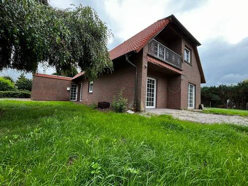 Seitenansicht - Einfamilienhaus mit 173,00 m² in Saterland zum Kaufen