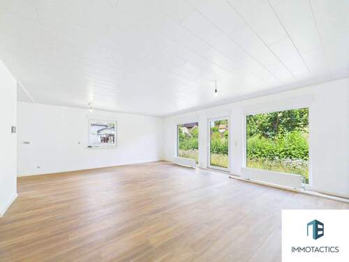 Wohnzimmer - Doppelhaushälfte mit 109,00 m² in Hahnenbach zum Kaufen