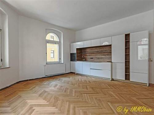 Wohnzimmer mit integrierter Küche - 