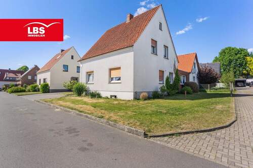 Seitenansicht - 1 Zimmer Mehrfamilienhaus, Wohnhaus zum Kaufen in Georgsmarienhütte