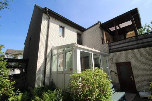 Glasanbau mit Blick auf Terrasse - Doppelhaushälfte mit 143,00 m&sup2; in Mülheim an der Ruhr zum Kaufen