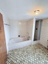 Badewanne und Dusche - 