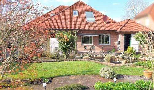 Ansicht hinten - Einfamilienhaus mit 180,00 m&sup2; in Rhauderfehn zum Kaufen