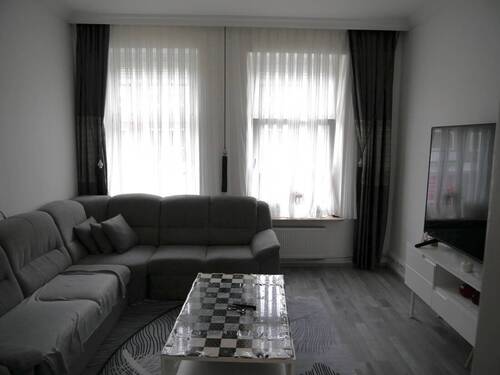 Wohnzimmer - 1 Zimmer Mehrfamilienhaus, Wohnhaus zum Kaufen in Brunsbüttel