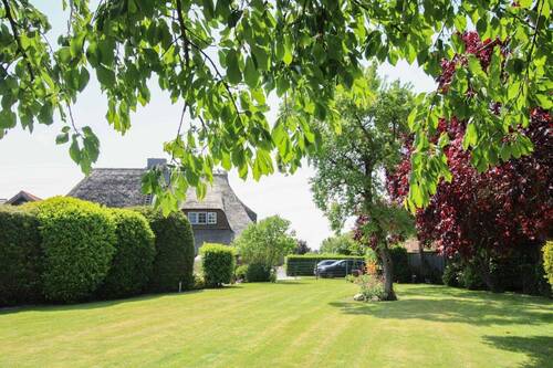 Garten - Gepflegte Doppelhaushälfte unter Reet samt Garten, Sauna, Whirlpool und Bauland in Feldrandlage