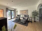 Durchgang mit Kamin - Zugang zur Terrasse - 