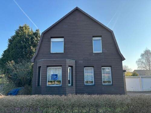 Außenansicht - 7 Zimmer Mehrfamilienhaus, Wohnhaus zum Kaufen in Sande