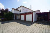 Ansicht Carport und Garage - Etagenwohnung mit 140,00 m² in Neuhausen ob Eck zum Kaufen