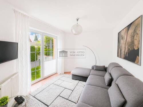 Wohnzimmer - Mehrfamilienhaus, Wohnhaus mit 142,00 m&sup2; in Bad Pyrmont zum Kaufen