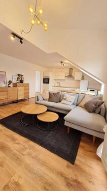 Bild 1 - Erstbezug nach Sanierung - Exklusive, vollmöblierte Dachgeschosswohnung mit Dachterrasse & TG