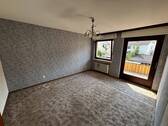 Wohnzimmer mit Balkon 1.OG - 