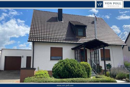 Titelbild - Gepflegtes Familiendomizil als Ein - oder Zweifamilienhaus nutzbar