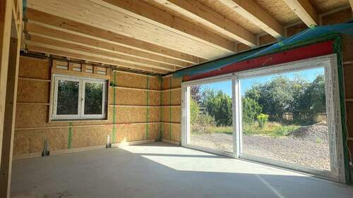 Wohnzimmer mit Garten - 