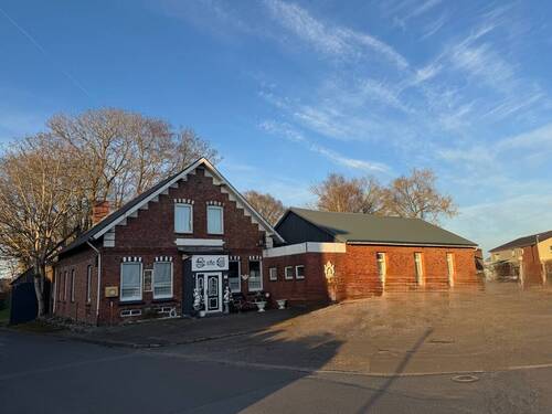 Ansicht von der Straße - 9 Zimmer Mehrfamilienhaus, Wohnhaus zum Kaufen in Buchholz