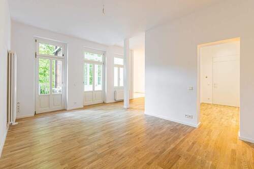 Wohnzimmer - 2-Zimmer-Eigentumswohnung mit Südbalkon und offener Wohnküche
