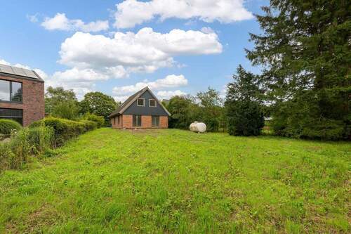 Hausansicht Garten - 4 Zimmer Einfamilienhaus zum Kaufen in Rethwisch