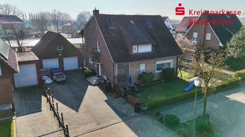 Objektansicht von der Straße - 5 Zimmer Mehrfamilienhaus, Wohnhaus zum Kaufen in Bramsche