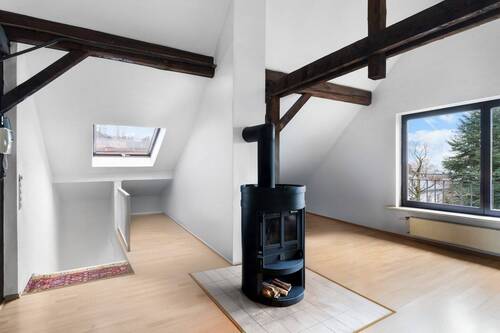 Offenes Wohnzimmer mit Kamin DG - 