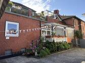 Ansicht - Großzügige 2- Zimmer Wohnung mit Einbauküche, Veranda und Carport- Stellplatz in rückwärtiger Citylage