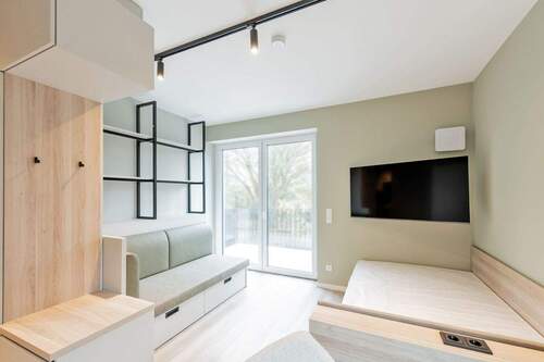 Wohnen/Schlafen - Neubau-Microapartment mit Balkon und Kochnische