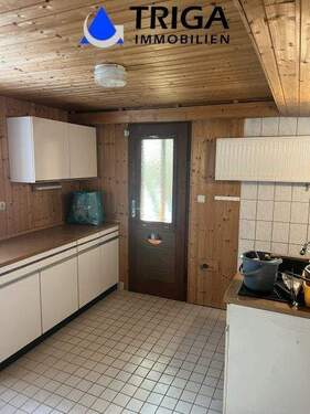 Waschküche im Untergeschoss mit Ausgang zum Grundstück - 