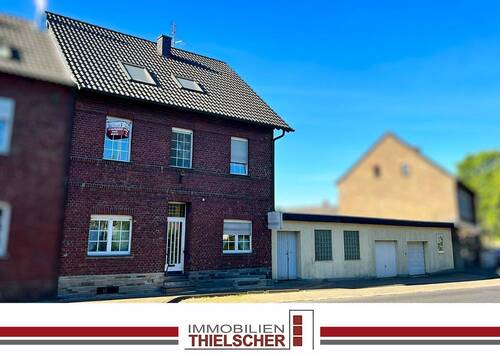 0 Titelbild - Wohnhaus mit 2 Garagen und großem Grundstück, sowie Lagerfläche, in Geilenkirchen-Leiffarth