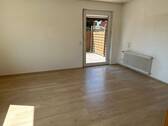 Wohnzimmer (vordere Whg) - 8 Zimmer Mehrfamilienhaus, Wohnhaus zum Kaufen in Rastede