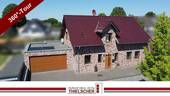 1 Titelbild - Exklusives Einfamilienhaus mit großer Doppelgarage, schönem Gartenbereich und Smart-Home-Komfort