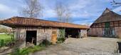 Nebengebäude mit Werkstatt und Carport - 