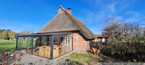Ansicht auf den Wintergarten - 5 Zimmer Bauernhaus, Landhaus in Ovelgönne