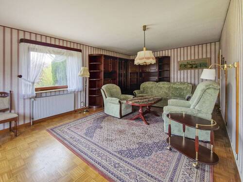 Wohnzimmer im Erdgeschoss - 4 Zimmer Einfamilienhaus zum Kaufen in Wewelsfleth