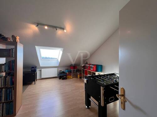 Zimmer im Dachgeschoss - 