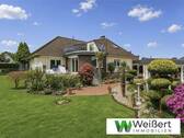 Titelbild - Zwischen Gartenidylle und Wohnkomfort - Großzügiges Ein-Zweifamilienhaus auf 1.176 m² Traumgrundstück