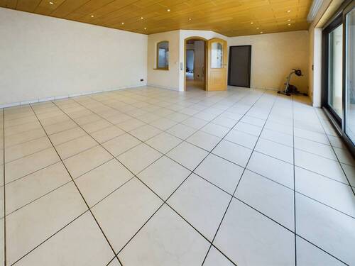 Wohnzimmer EG - Mehrfamilienhaus, Wohnhaus mit 387,00 m² in Bürstadt zum Kaufen