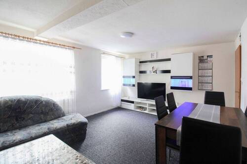 Wohnzimmer - 6 Zimmer Einfamilienhaus zum Kaufen in Murrhardt