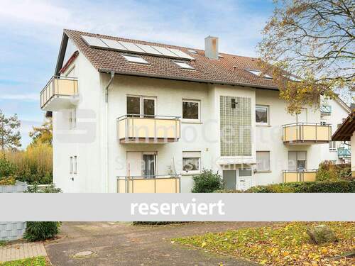 Außenansicht - Investition mit Perspektive: Sanierungsbedürftige Wohnung mit 2 Balkonen und Garage in Wolfartsweier