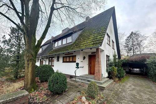 Außenansicht - Renovierungsbedürftige DHH in Reinbek