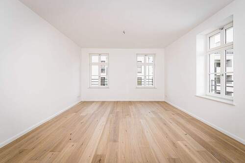 Wohnzimmer - 5-Zimmer Eigentumswohnung mit 2 Balkonen und 2 Bädern