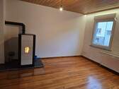 Wohnzimmer mit Pelletoven - 4 Zimmer Reihenmittelhaus zur Miete in Kirkel