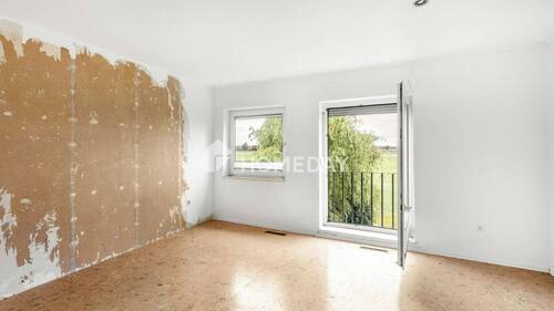 1. OG Schlafzimmer 1 - 