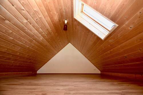 Schlafbereich im Spitzboden - 