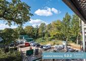 Ausblick 5.2.2_1 - Südwestbalkon & Licht in jedem Raum - 4-Zi.-Wohntraum mit Flexibilität & Stil für die ganze Familie