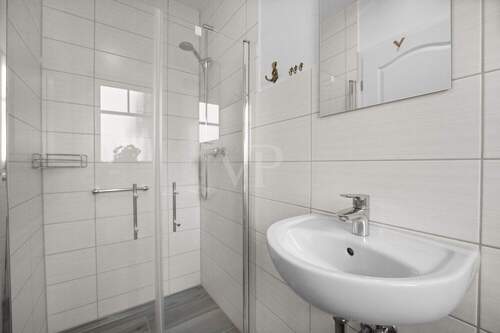 Das Gästebad mit Dusche - 
