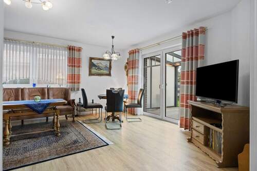 Das Wohnzimmer - Einfamilienhaus mit 105,50 m² in Wangerland zum Kaufen
